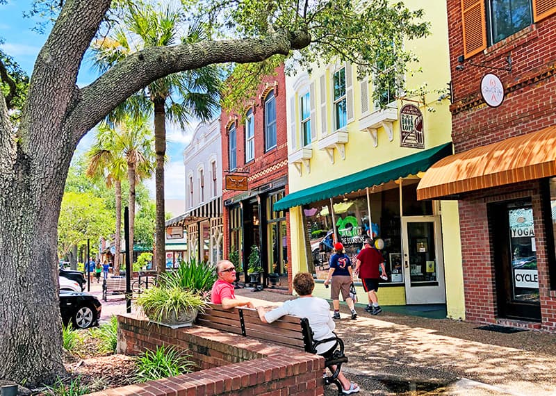 Historic Centre Street in downtown Fernandina Beach, Amelia Island, lined with colorful shops and oak trees